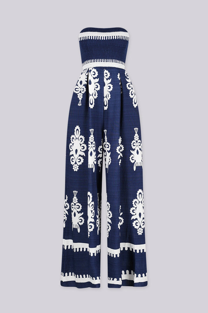 Wide leg strapless jumpsuit featuring high contrast retro print
Elasticized smocked tube top with pull on styling