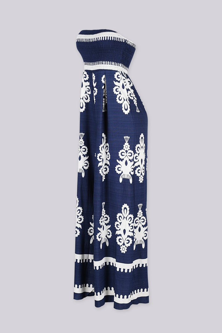 Wide leg strapless jumpsuit featuring high contrast retro print
Elasticized smocked tube top with pull on styling
