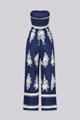 Wide leg strapless jumpsuit featuring high contrast retro print
Elasticized smocked tube top with pull on styling