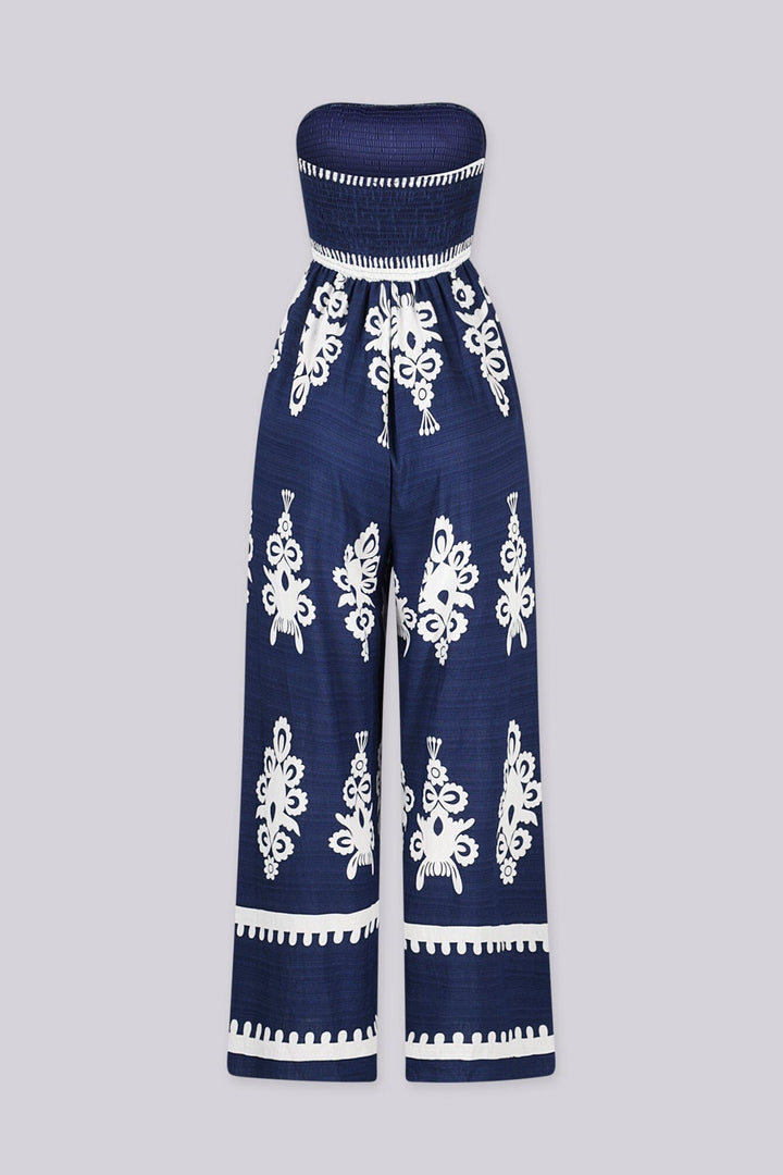 Wide leg strapless jumpsuit featuring high contrast retro print
Elasticized smocked tube top with pull on styling