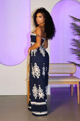 Wide leg strapless jumpsuit featuring high contrast retro print
Elasticized smocked tube top with pull on styling