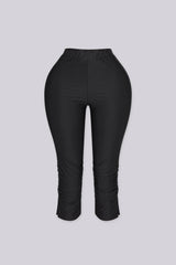 High waist capri pants with side ruched detail and side slit, Nylon elastic material, Slip on closure
