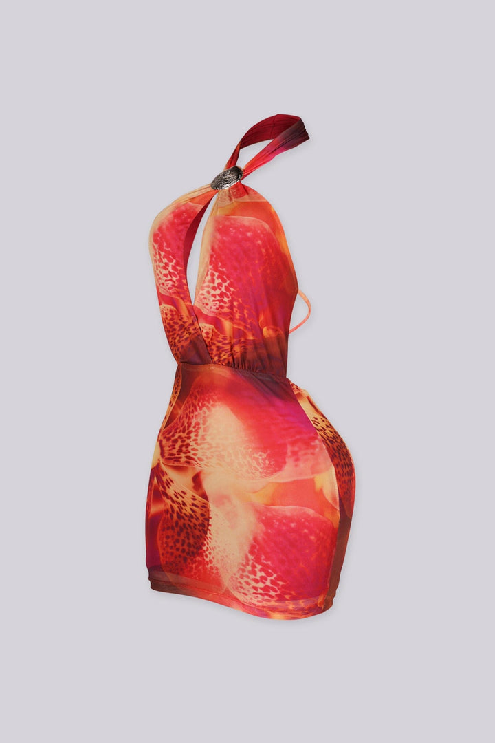 Sheer mesh halter mini dress featuring an adjustable shell shaped hardware detail
Fully open back with adjustable tie back straps