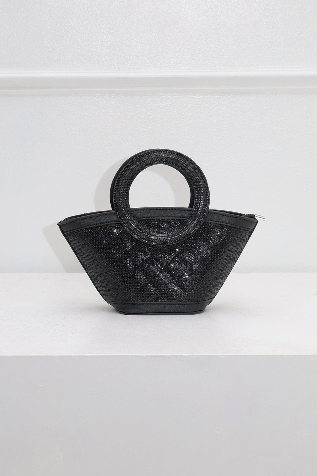 EDGE — black rhinestone-embellished top-handle bag, front view flat lay