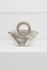 EDGE — gold rhinestone-embellished top-handle bag, angled view flat lay