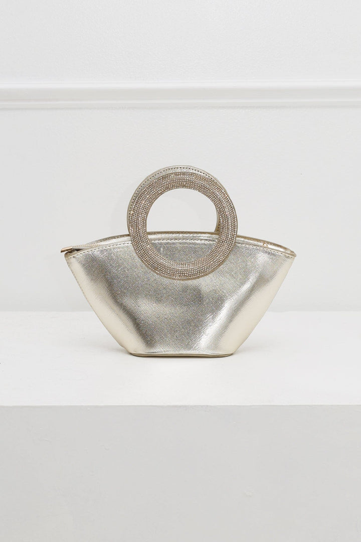 EDGE — gold rhinestone-embellished top-handle bag, angled view flat lay