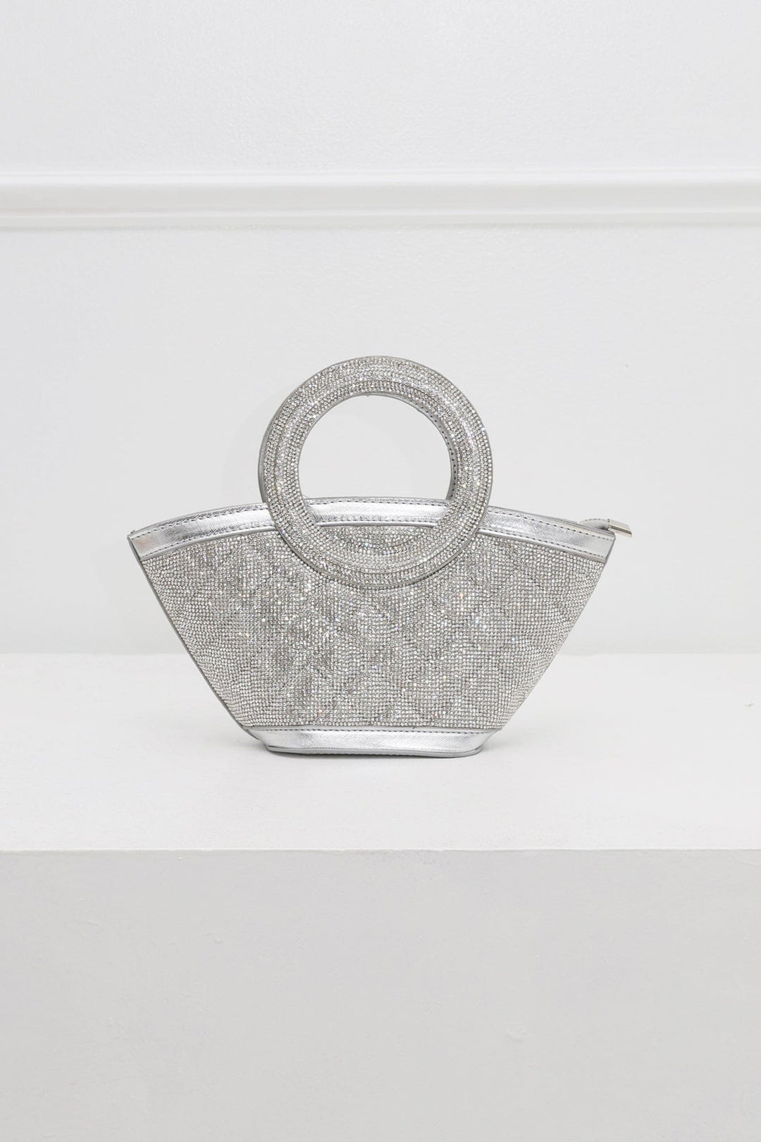 EDGE — silver rhinestone-embellished top-handle bag, front view flat lay