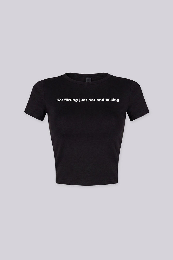 Cropped crew neckline graphic tee with "not flirting just hot and talking"