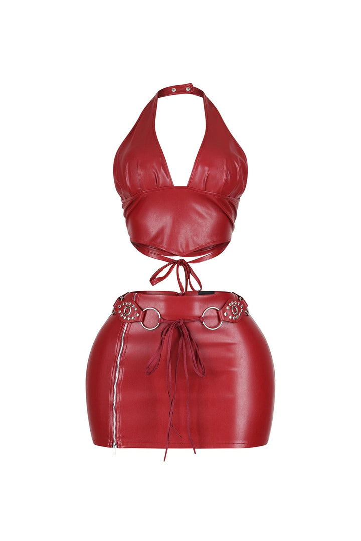 Stretched faux leather halter top featuring an open back with lace up closure
Matching high waisted faux leather mini skirt with side zipper