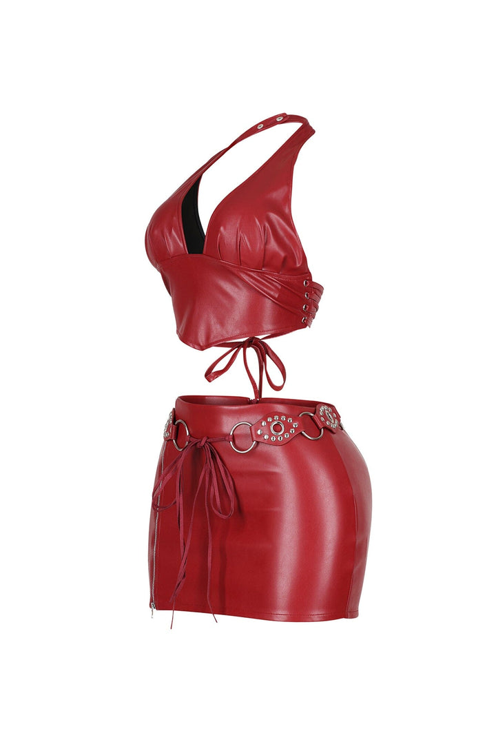 Stretched faux leather halter top featuring an open back with lace up closure
Matching high waisted faux leather mini skirt with side zipper
