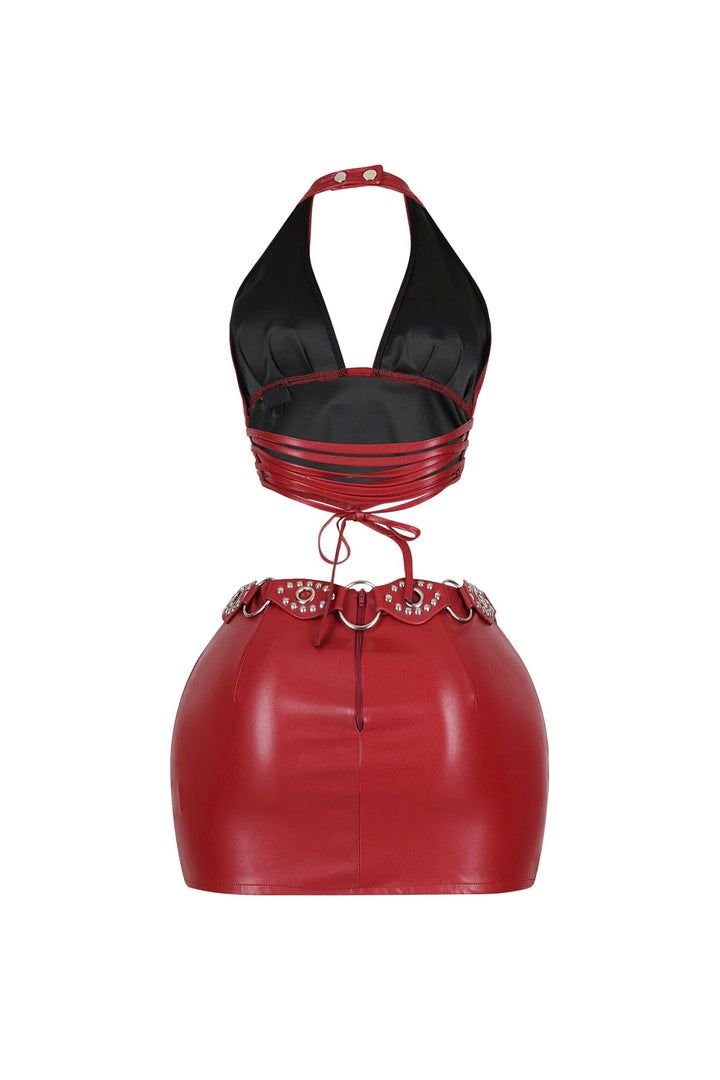 Stretched faux leather halter top featuring an open back with lace up closure
Matching high waisted faux leather mini skirt with side zipper