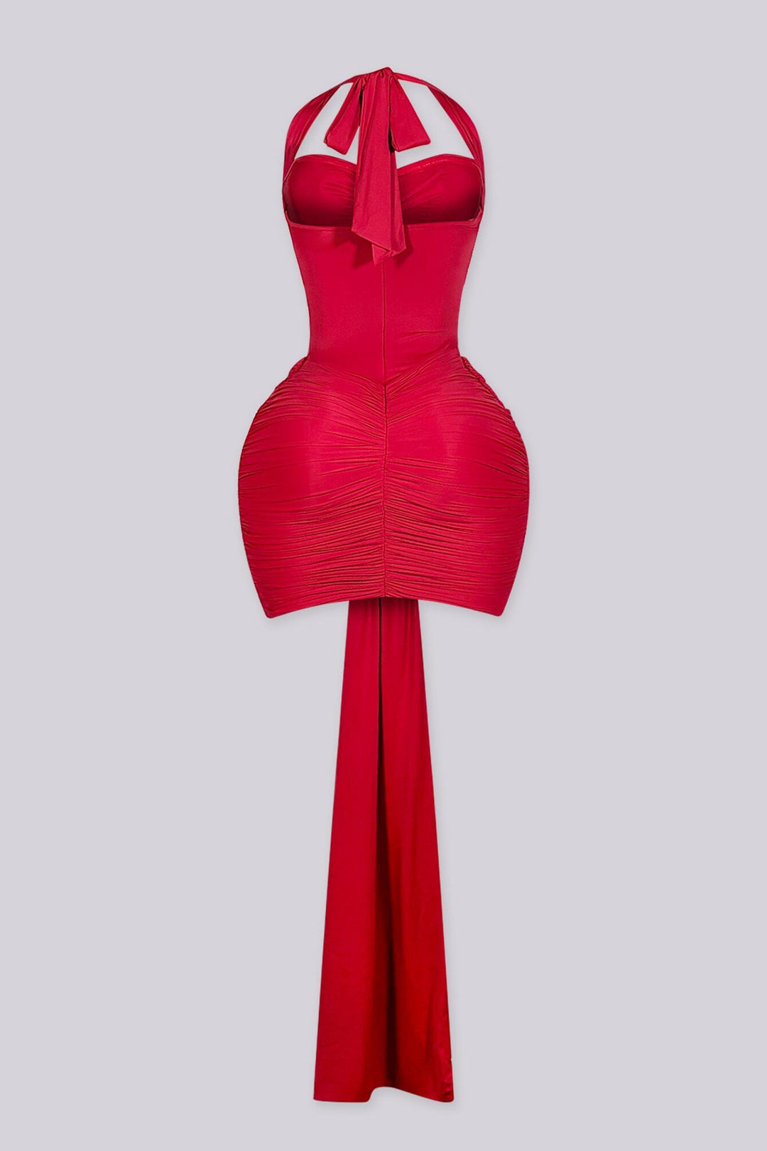 Fitted halter neck mini dress featuring mesh cutout across the midriff
Heavy center front ruching with extended sash tail detail