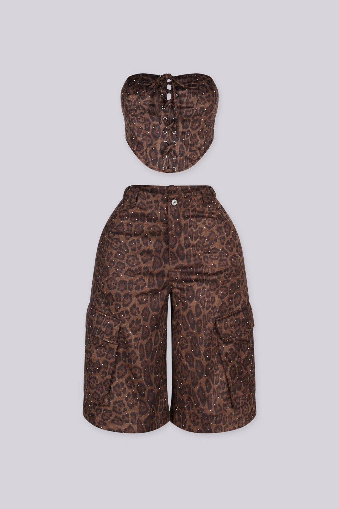 Leopard print tube top with rhinestone embellishments throughout featuring lace up front detailing