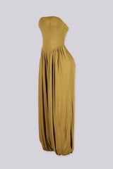 Strapless wide leg jumpsuit featuring a flattering V-shaped dropped waistline, Banded elastic cuffs cinch in at the ankle for a bubble hem finish
