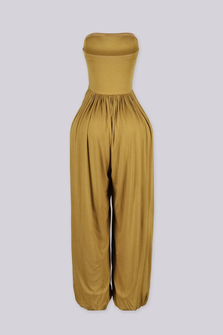 Strapless wide leg jumpsuit featuring a flattering V-shaped dropped waistline, Banded elastic cuffs cinch in at the ankle for a bubble hem finish