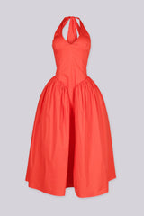 Halter dress with deep V neckline
fitted bodice with dropped waist seam
Built in tulle under layer for added volume
