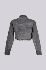 Eye catching denim crop jacket featuring a raw hem and sparkling rhinestone detailing throughout
