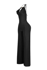 Wide leg halter jumpsuit with deep plunging cowl neck featuring a metal choker detail