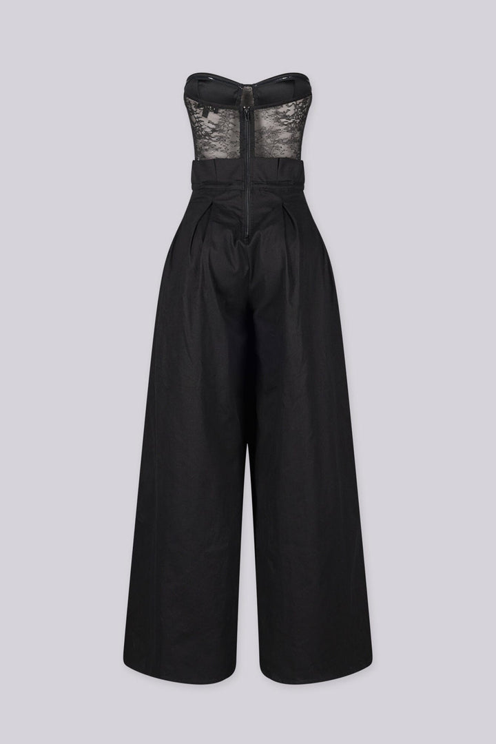 Strapless sheer lace corset jumpsuit with sweetheart bustier bodice 
High waisted wide leg featuring fitted waistband with drawstring tie at the center front