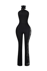 Halter neck jumpsuit with metallic gold ring accent at the throat featuring full length floral lace insert along the side seam