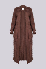 Long sleeve chunky cable knit cardigan in a floor grazing duster length with open front featuring ribbed cuffs and trim