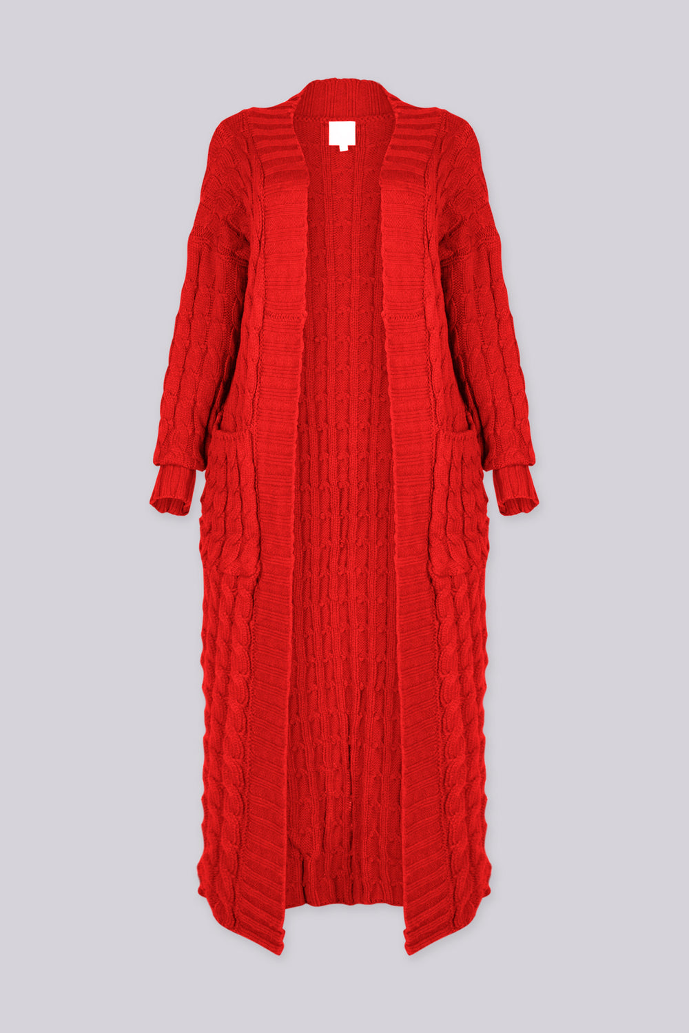Long sleeve chunky cable knit cardigan in a floor grazing duster length with open front featuring ribbed cuffs and trim