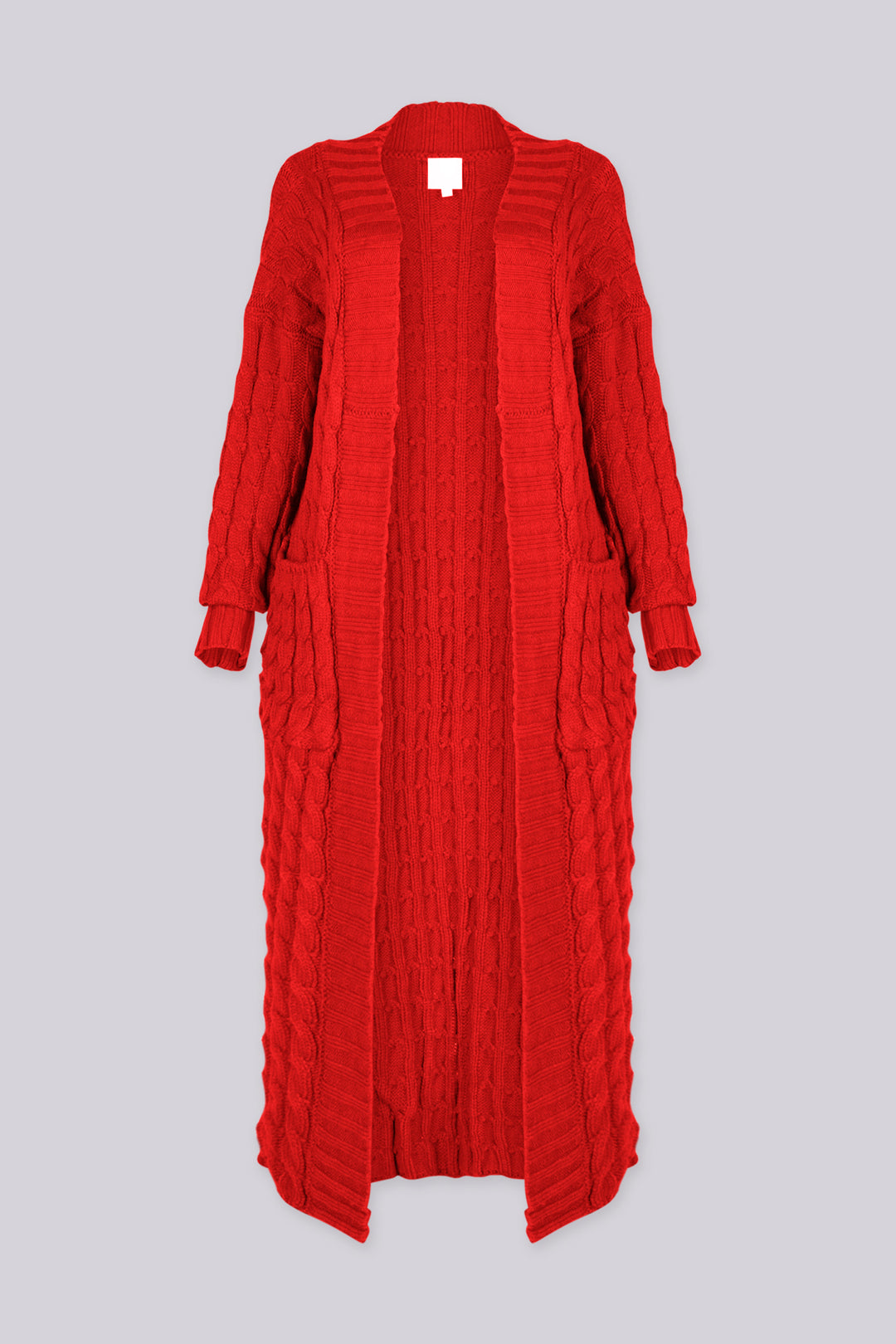 Long sleeve chunky cable knit cardigan in a floor grazing duster length with open front featuring ribbed cuffs and trim