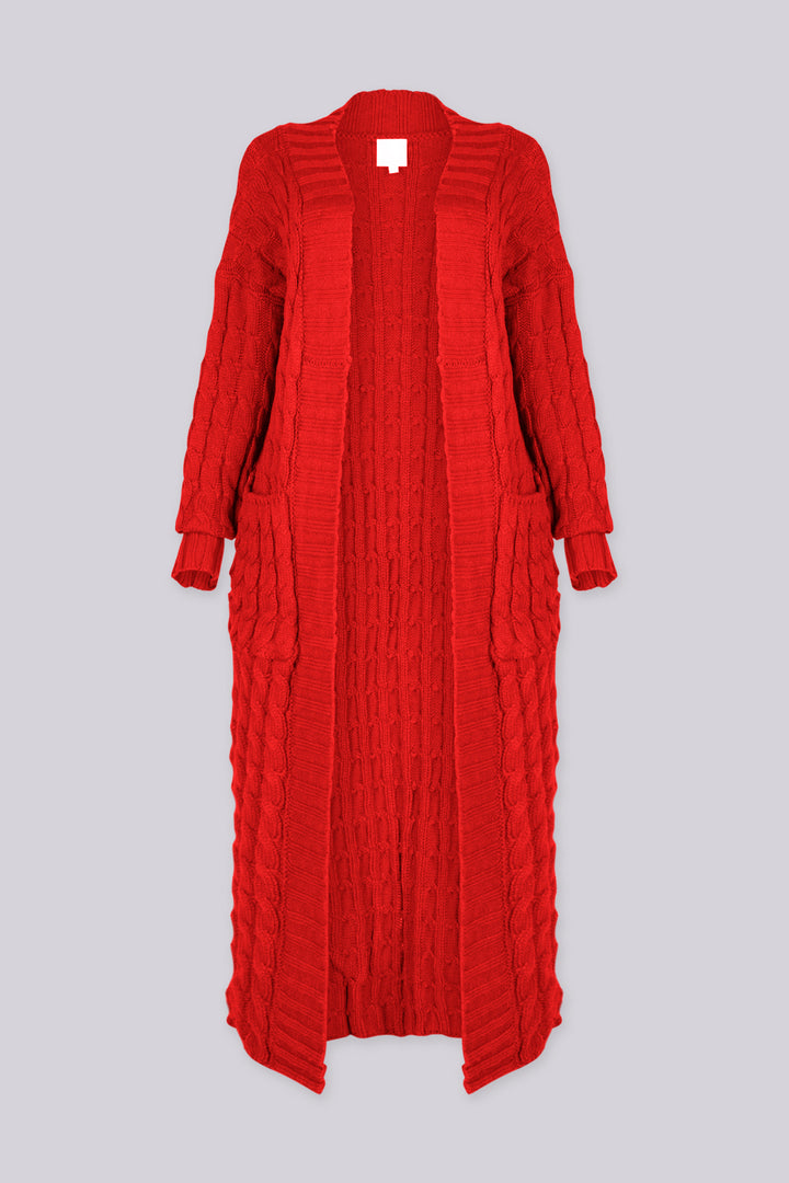 Long sleeve chunky cable knit cardigan in a floor grazing duster length with open front featuring ribbed cuffs and trim