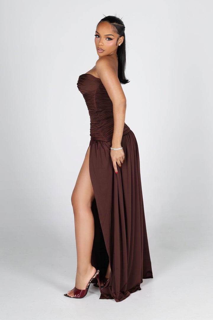 Dropped waist strapless maxi dress with a heavily ruched bodice for a sculpted fit