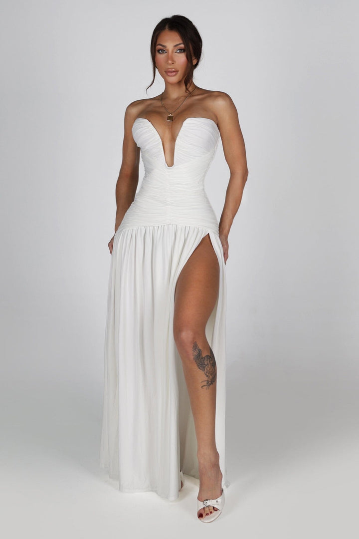 Dropped waist strapless maxi dress with a heavily ruched bodice for a sculpted fit