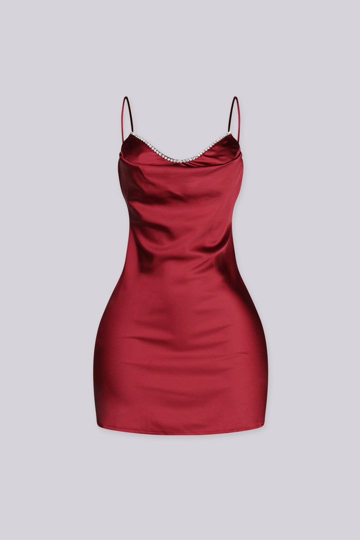Mini dress with a cowl neckline featuring rhinestone trim and adjustable spaghetti straps