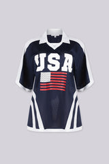Oversized mesh jersey featuring v neck paired with a classic white fold-over polo collar