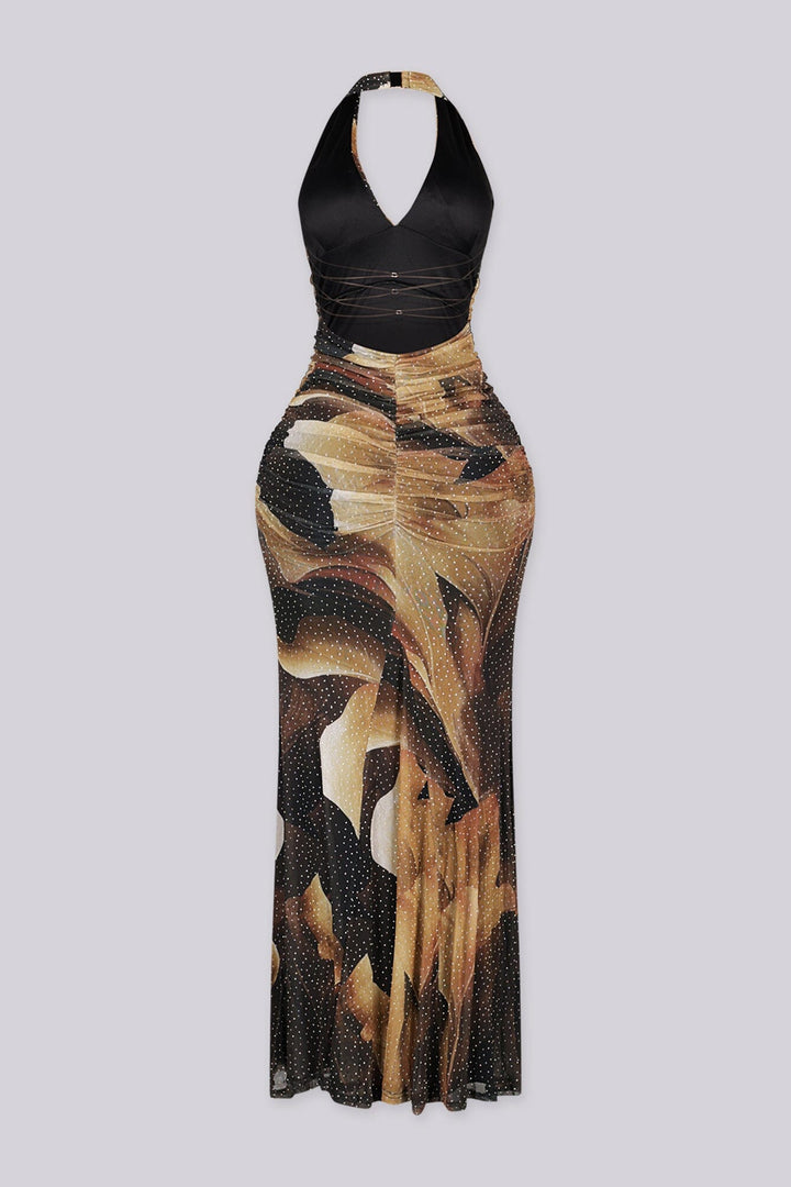 Mesh halter maxi dress with a plunging draped neckline featuring allover rhinestone embellishments