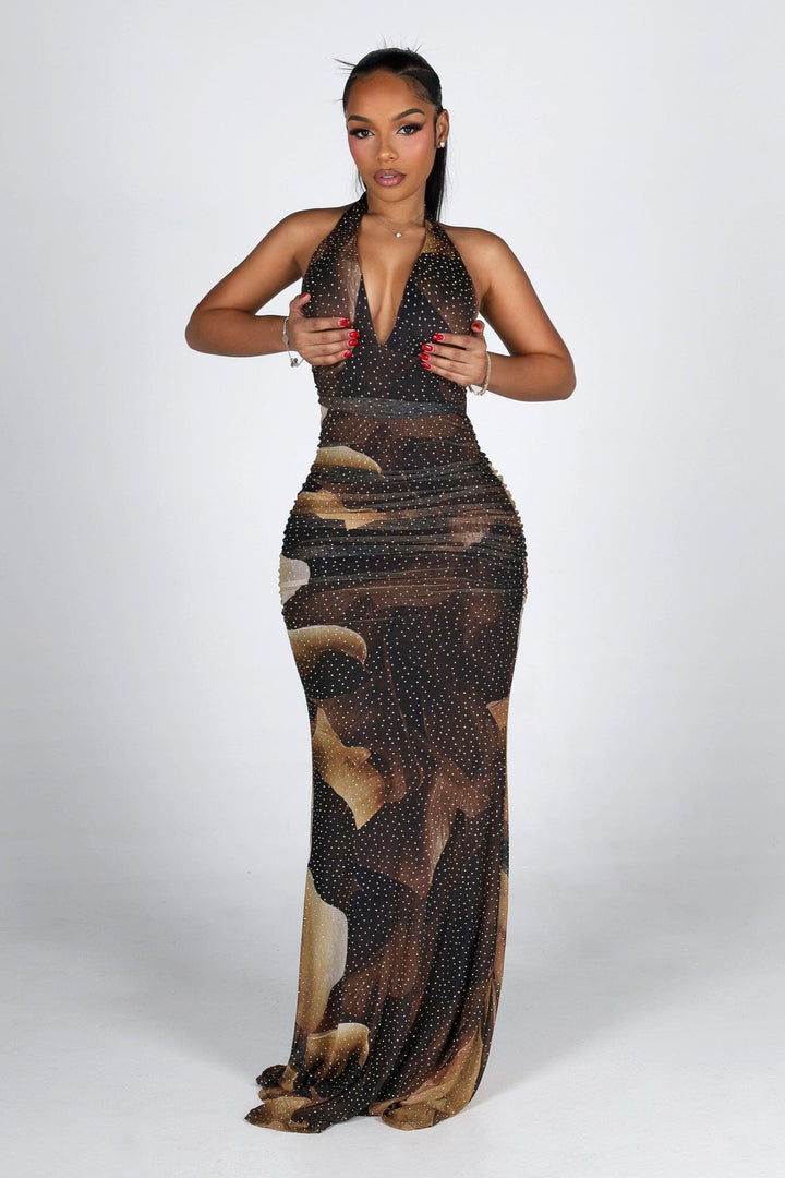 Mesh halter maxi dress with a plunging draped neckline featuring allover rhinestone embellishments