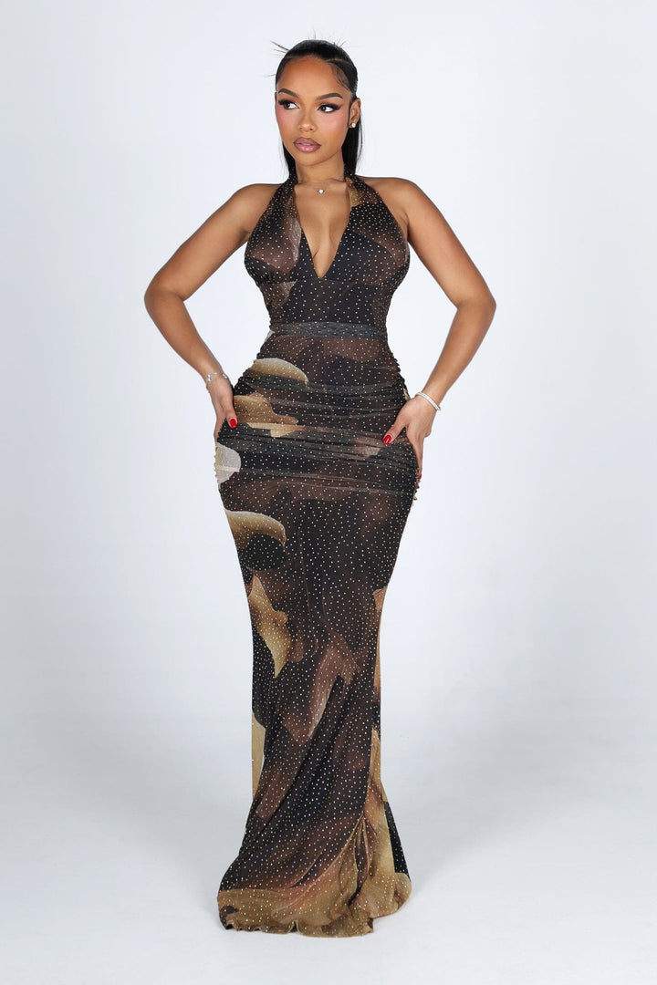 Mesh halter maxi dress with a plunging draped neckline featuring allover rhinestone embellishments