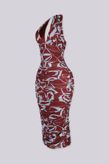 Bodycone silhouette mesh halter neckline dress with a deep plunging V front