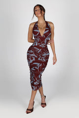Bodycone silhouette mesh halter neckline dress with a deep plunging V front