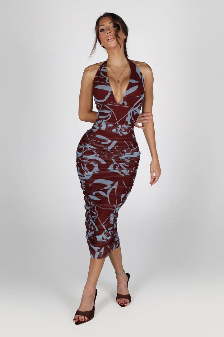 Bodycone silhouette mesh halter neckline dress with a deep plunging V front