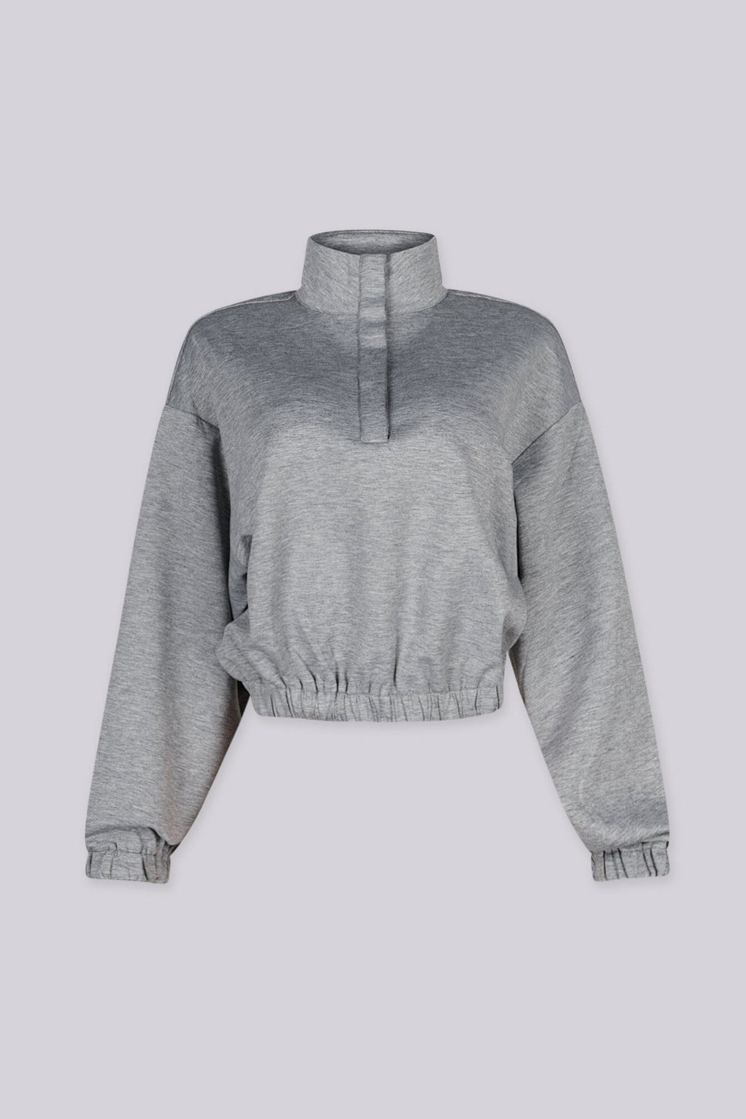 Cropped pullover sweatshirt with mock neckline and balloon sleeves featuring elastic hem and cuffs
