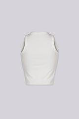 White ribbed tank top featuring "pretty girls drink matcha" embroidered graphic