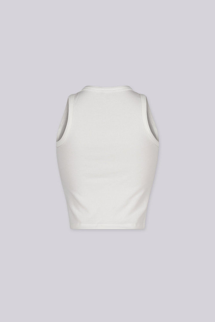 White ribbed tank top featuring "pretty girls drink matcha" embroidered graphic
