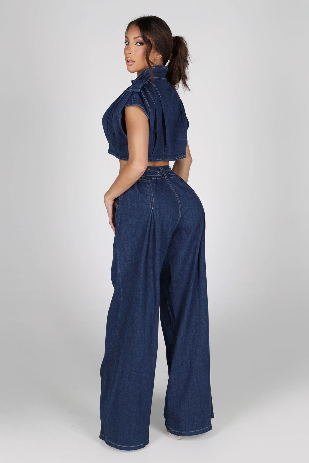 Cap sleeve structured denim crop top featuring convertible stand collar with snap and hidden zip closure at front