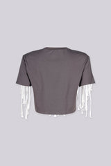 Cropped short sleeve vintage graphic t-shirt featuring distressed winged heart design