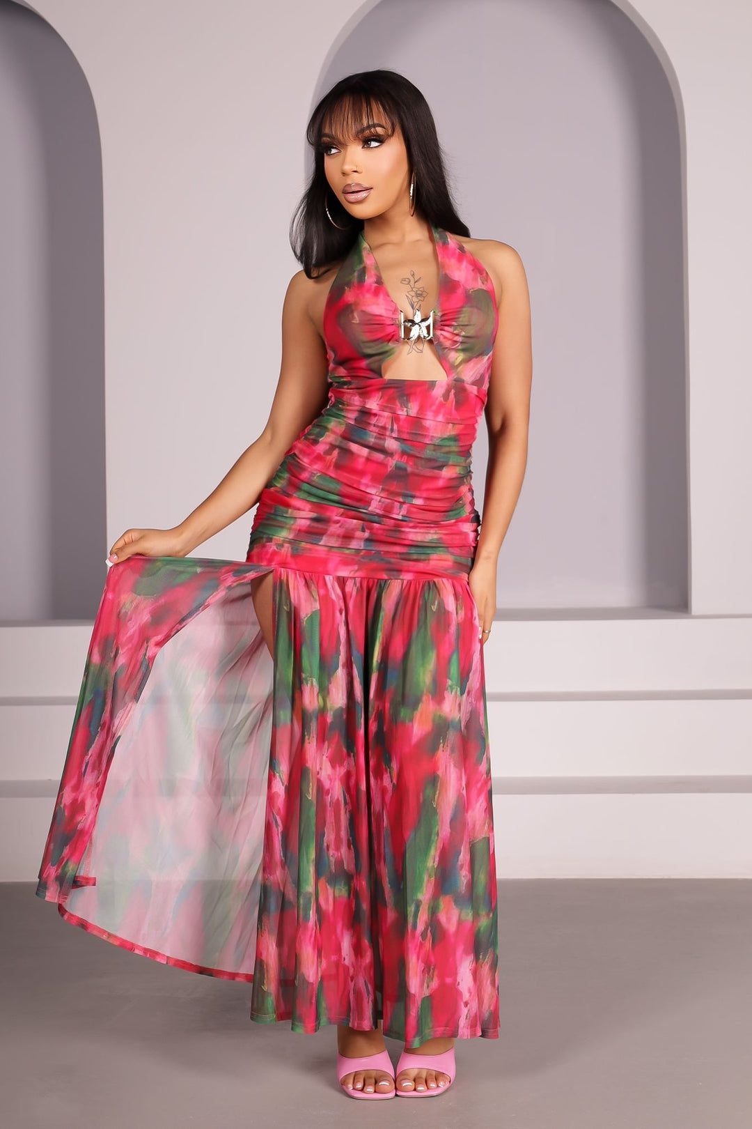 Starfish metal ornament accent at the center front
Sheer mesh skirt finished with a separate lining layer and left side slit detail
