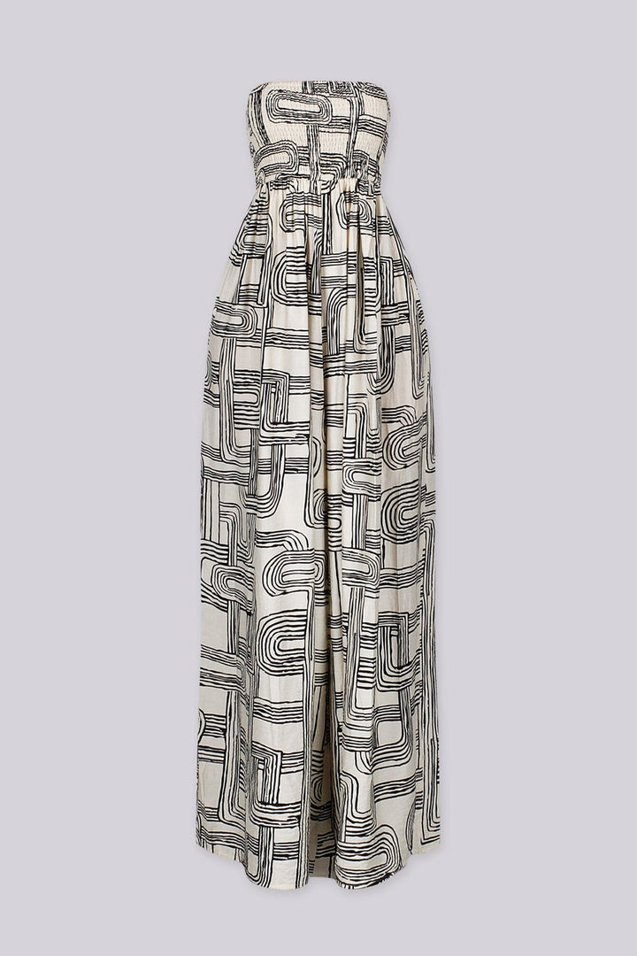 Retro geometric print tube top jumpsuit featuring a smocked bodice for secure and stretchy fit, High waisted wide leg fit