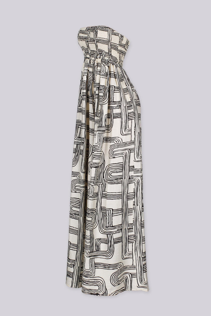Retro geometric print tube top jumpsuit featuring a smocked bodice for secure and stretchy fit, High waisted wide leg fit