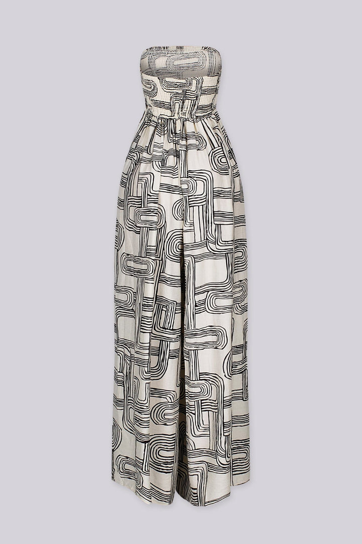 Retro geometric print tube top jumpsuit featuring a smocked bodice for secure and stretchy fit, High waisted wide leg fit