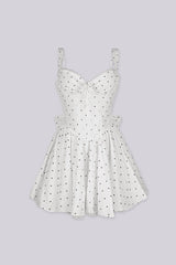 Corset bodice polka dot mini dress featuring sweetheart neckline with delicate lace trim