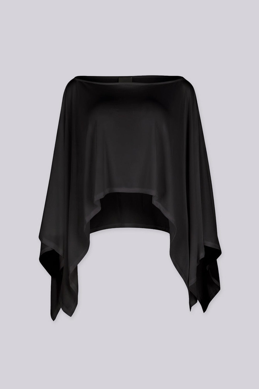 Sheer mesh poncho top with a wide boat neckline featuring asymmetrical 