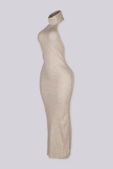 Sleeveless ribbed knit urtleneck maxi dress with halter neckline featuring body skimming stretch fit